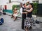 Couple dances to street musicians\' jazz on Montmartre in Paris