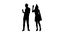 Couple dancing and drinking from glasses a party to the birthday. White background. Silhouette