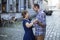 Couple dancing on the street of the old town. Newlyweds on their honeymoon.