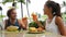 Couple dating having fun drinking alcohol on beach