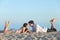 Couple dating and resting on the beach sand