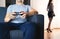 Couple in distant marriage. Man playing video game ignoring woman. Lack of connection. Relationship fight and crisis. Lazy husband