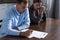 Couple with divorce documents at table