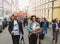 Couple with dog on hands on Helsinki Pride festival on the street