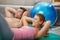 Couple doing abdominal crunch