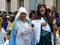 Couple dressed as Joseph and Mary with baby Jesus doll. Cuenca, ecuador
