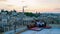 Couple with drink on rooftop of an cave house historical village of Ayvali Goreme Cappadocia Turkey