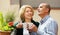 Couple drinking tea at balcony