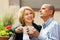 Couple drinking tea at balcony