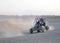 Couple driving Dune Buggy