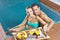 Couple eating breakfast in swimming