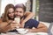 Couple Eating Breakfast Using Digital Tablet And Phone