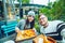 Couple eating in cafe outside