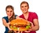 Couple eating fast food. Man and woman treat hamburger .