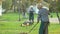 Couple of elderly gardeners working.