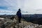 A couple embraces atop a mountain in the Colorado Rockies