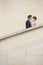 Couple Embracing On Stairway