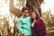 Couple embracing under the olive trees