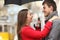 Couple encounter in the street under the rain