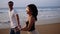 Couple enjoy summer vacation on the large beach, enjoy life and running in scenery slow motion video on background ocean