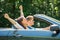 Couple Enjoying Drive In A Car