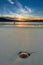 Couple enjoying gorgeous sunset on the beach. Luskentyre, Isle of Harris, Scotland.