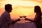 Couple enjoying romantic sunnset dinner