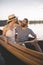 Couple enjoying a summer canoe ride