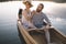 Couple enjoying a summer canoe ride