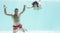 Couple enjoying underwater in swimming pool