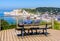 A couple enjoying the view over Etretat coast in Normandy