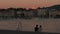 A Couple Enjoys the Geneva Waterfront at Sunset