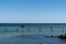 A couple enjoys a relaxing afternoon and the amazing views from the Infinite Bridge in Aarhus