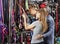 Couple Examining Leash At Pet Store