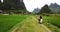 Couple exploring Yangshuo villages on the motorbike