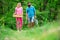 Couple of farmers walking in agricultural field. Gardening in spring - happy couple harvesting and having lots of fun. A