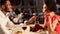 Couple Feeding Each Other Having Romantic Dinner In Restaurant, Panorama