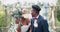 Couple, flower confetti and outdoor wedding with event, walk and happy laugh in nature. Black woman, man and excited for