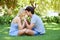 Couple, forehead touch and relax in park with love and commitment in healthy relationship. People on a date outdoor