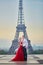 Couple in front of the Eiffel tower in Paris, France