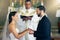 Couple getting married, wedding vows and love commitment at the alter of church during marriage ceremony. Happy bride