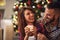 Couple with gift together on Christmas eve