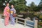 Couple of girls wearing colorful traditional japanese kimono in Kenrokuen, the famous Japanese landscape garden in Kanazawa Japan