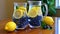 a couple of glasses of blueberries and lemons