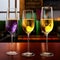 Couple glassess of the champagne or white wine are placed on wooden table in restaurant background. Generative Ai image.
