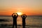 Couple at golden sunset at beach