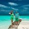 Couple in green on a beach at Maldives