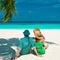 Couple in green on a beach at Maldives