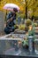 Couple in grief on a cemetery in fall