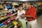 Couple in grocery store.